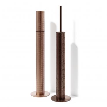 Floor-standing Filo and Filo with Slim Handle toilet brushes with Graffiti textures and circular bases.